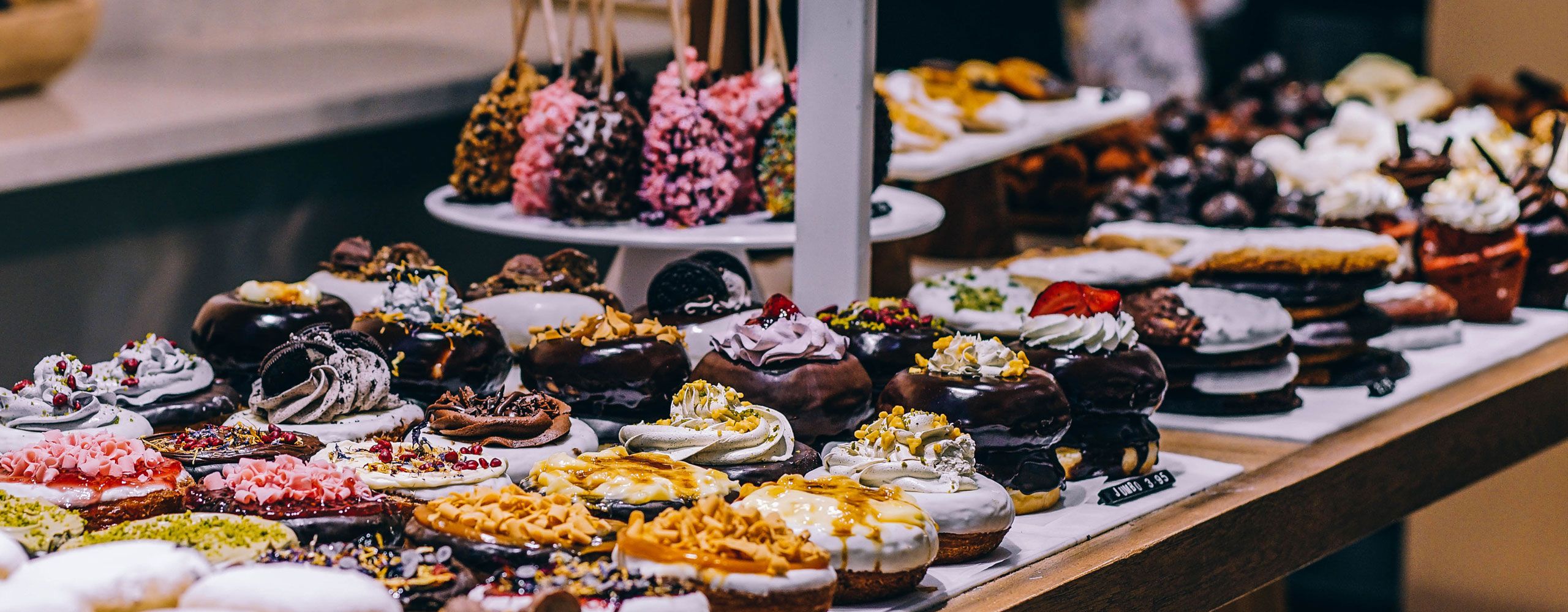 A table with plenty of desserts and cakes
